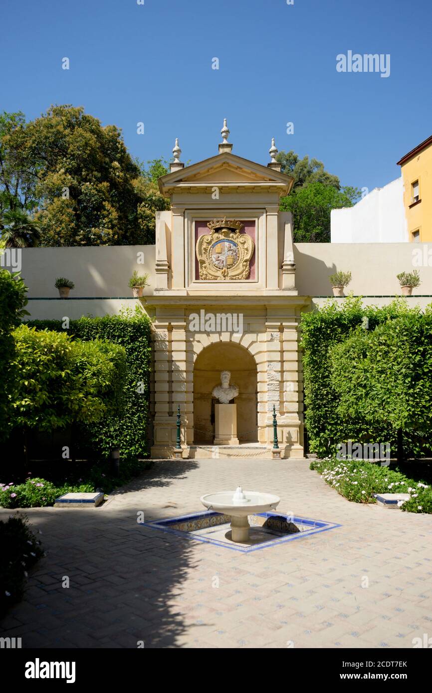 Seville, Spain - June 19: Water fountain in the Alcazar garden, Seville, Spain on June 19, 2017. Stock Photo