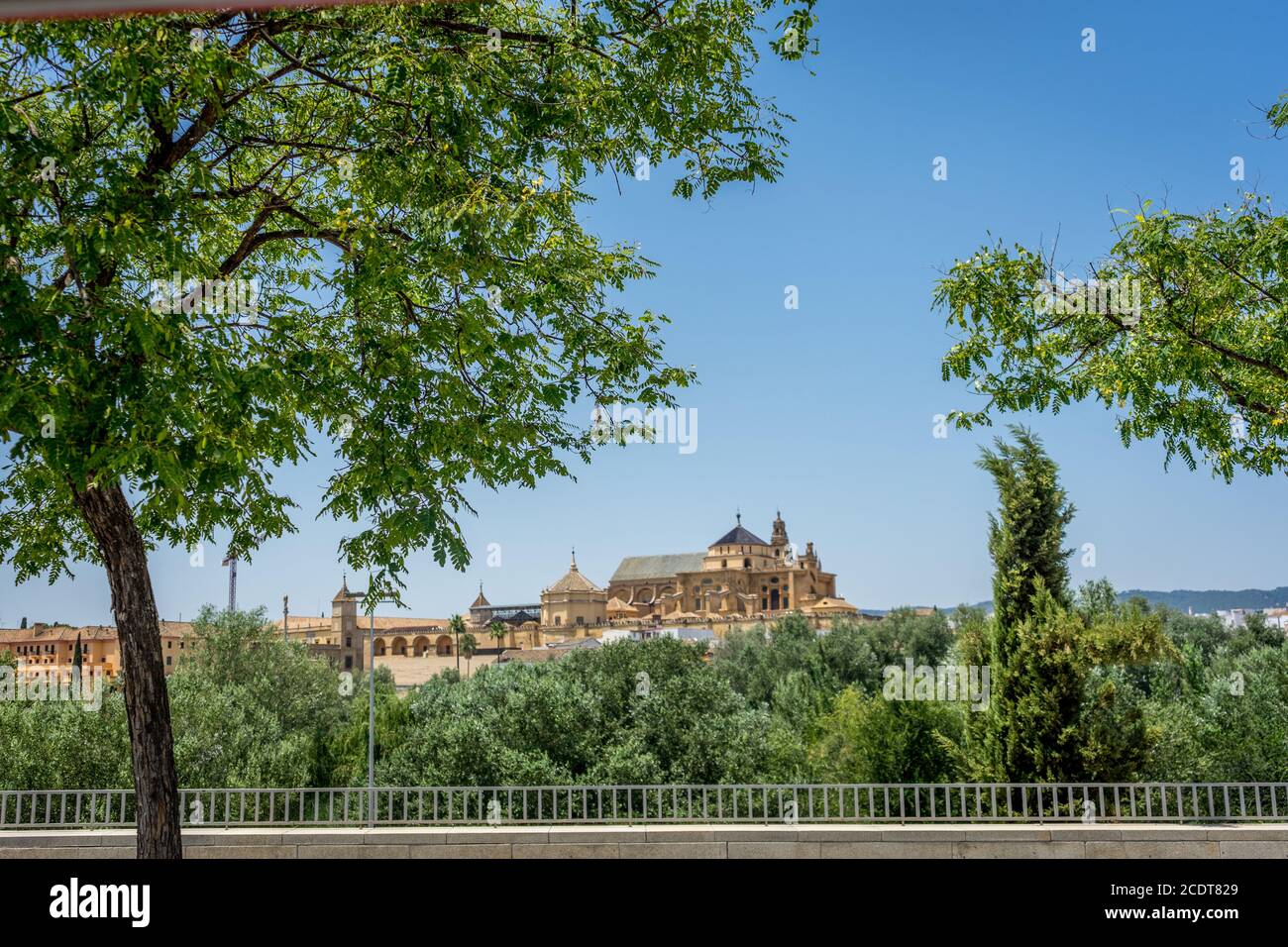 The Cathedral mosque of Cordoba from across the roman bridge Stock Photo