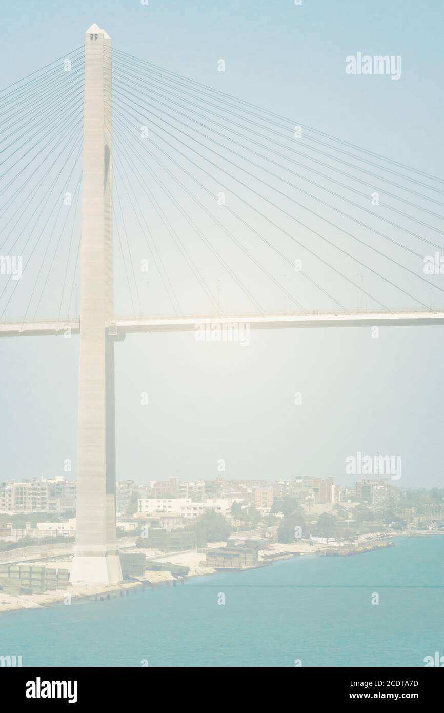 The Suez Canal at El-Qantara with Mubarak Peace Bridge Stock Photo