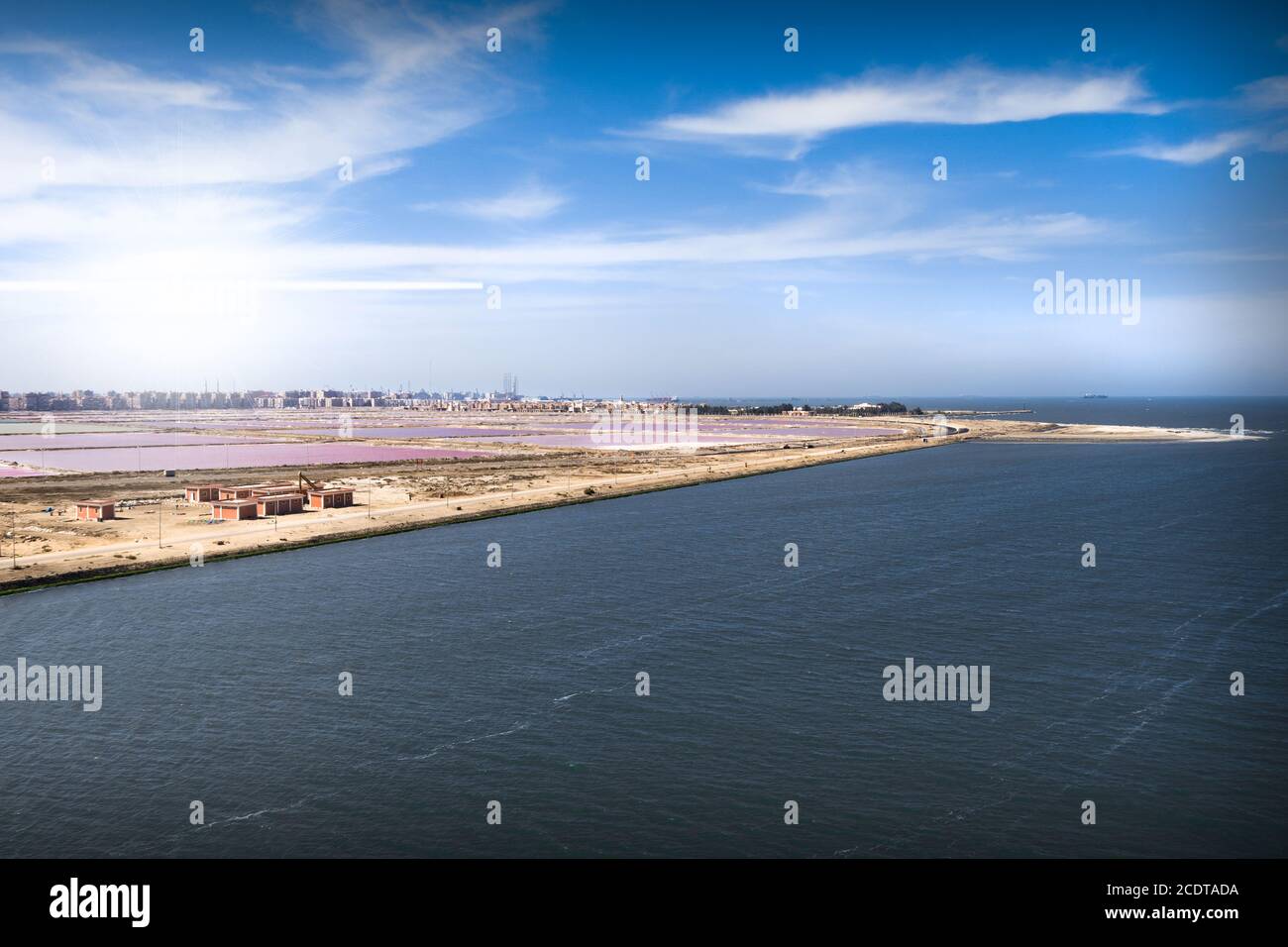 The junction of the Suez Canal into the Mediterranean at Port Said and Port Fouad Stock Photo