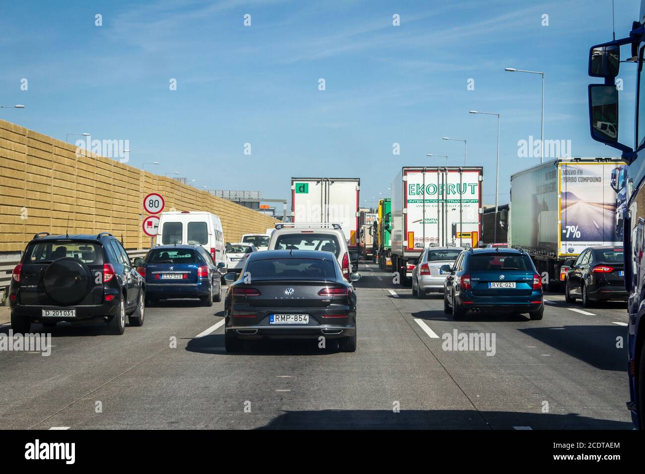 Cars and trucks stuck in traffic jam on the Budapest highway, Hungary on a hot summer day Stock Photo