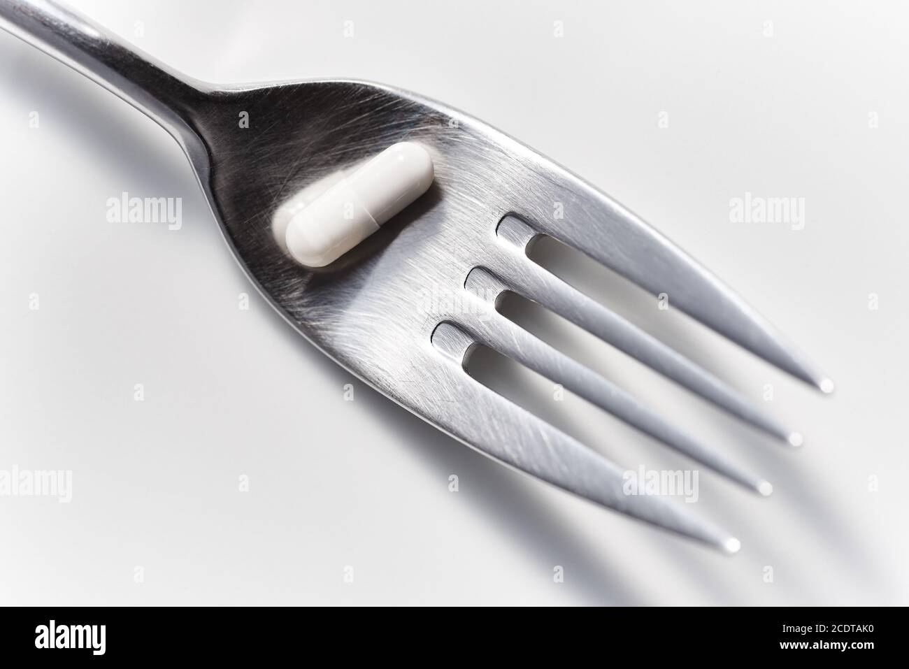 Fork with Capsule Stock Photo