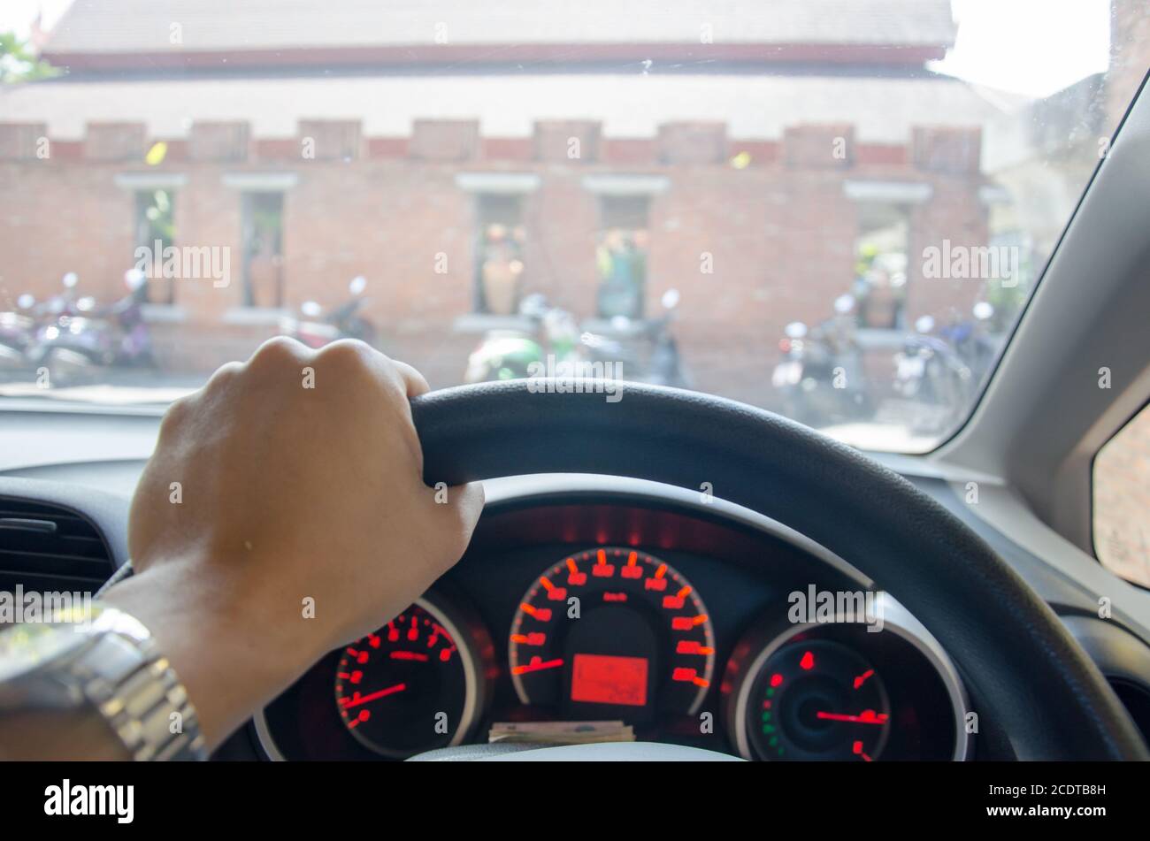 Gripping the steering wheel hires stock photography and images Alamy