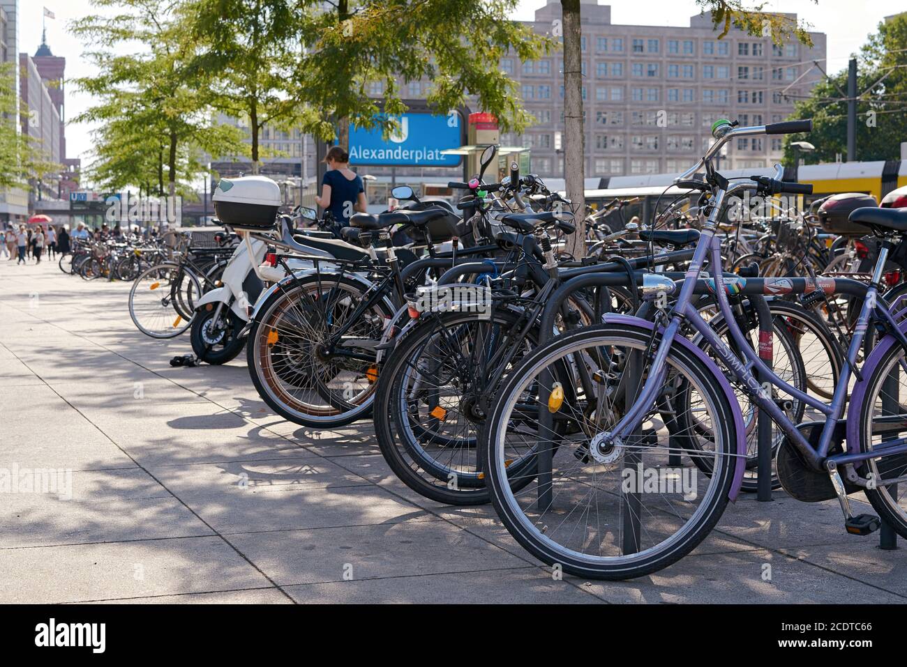 Bicycles on a bicycle rack at the underground station Alexanderplatz in Berlin Stock Photo