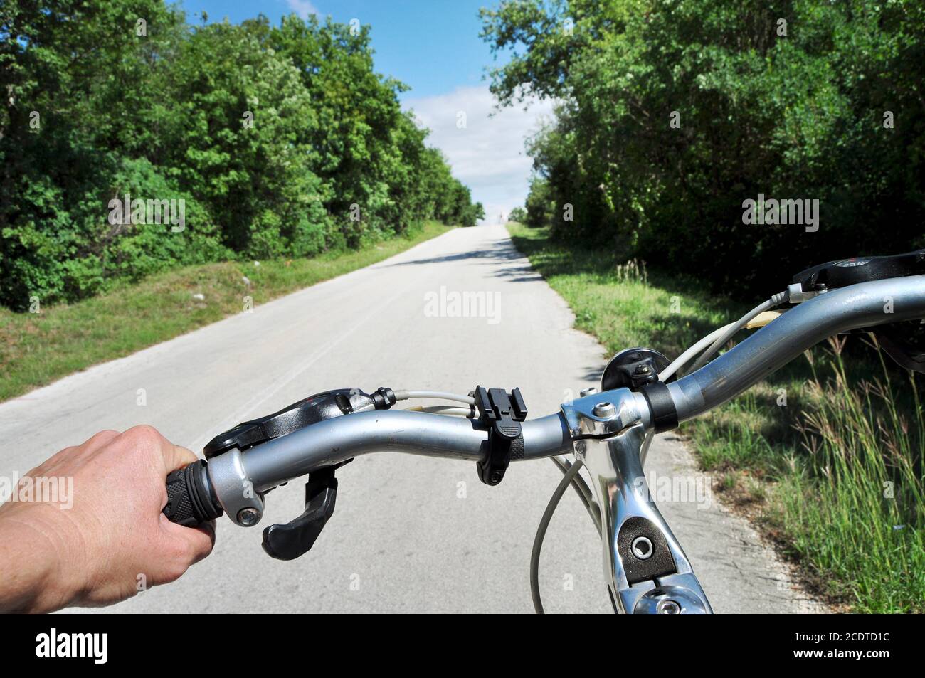 Biking through the contry side, rider's view Stock Photo
