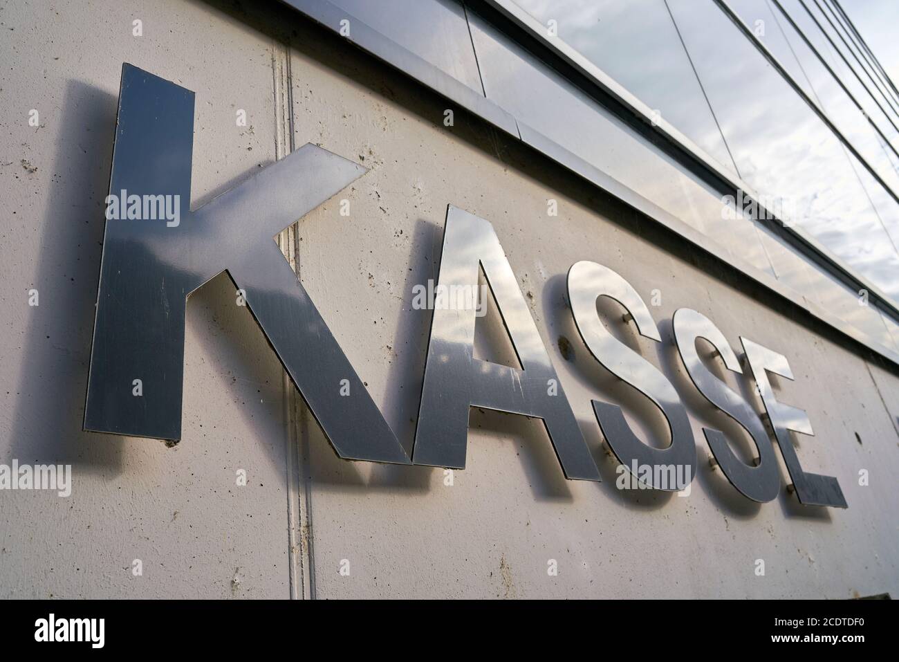 indicating label „Kasse” for the cash machine of a parking garage in the city center of Dresden Stock Photo