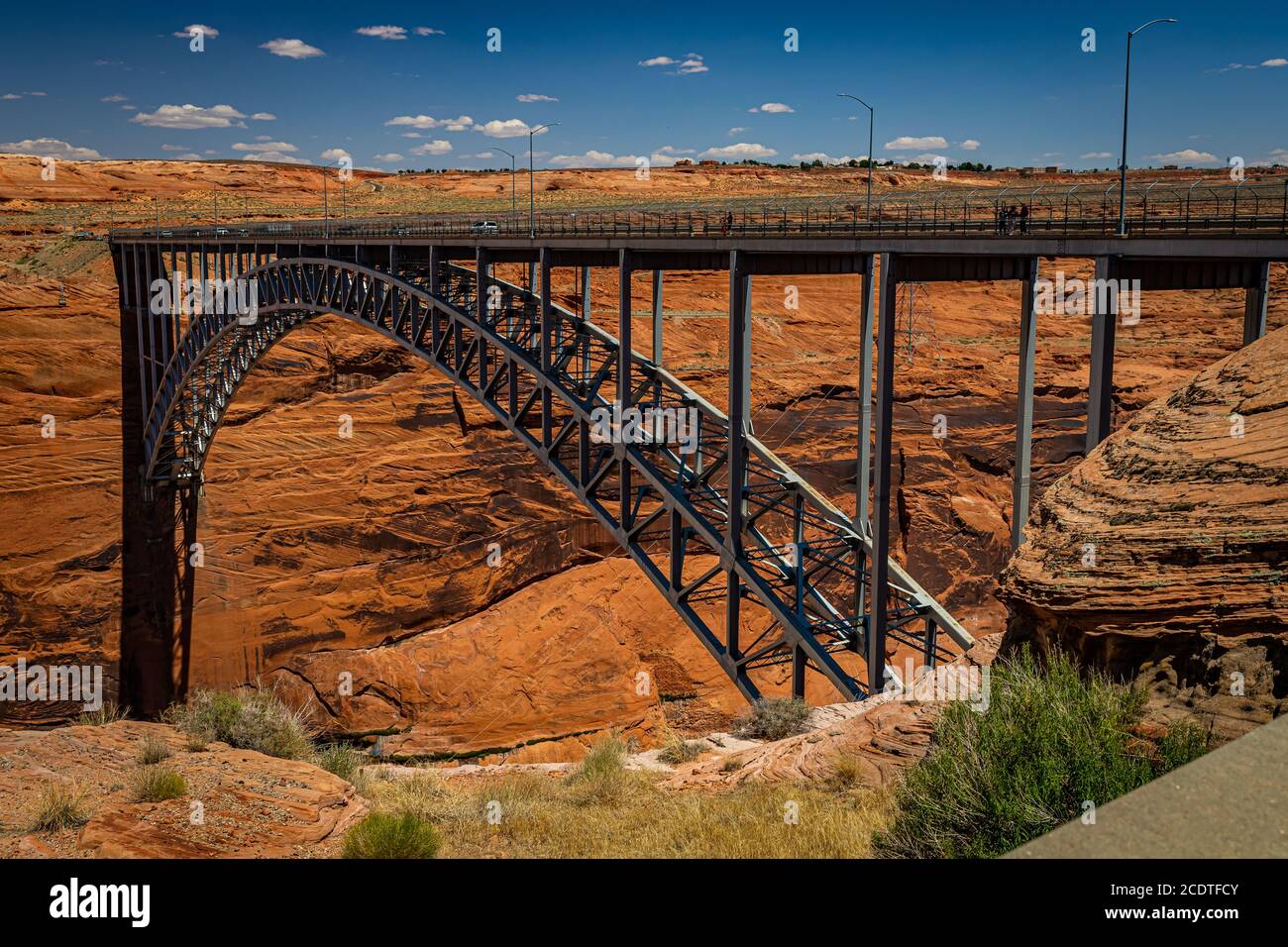 Page, Arizona, USA - June 12, 2020: The Glen Canyon Dam Bridge crosses the Colorado River immediately south of the Glen Canyon Dam and the southern en Stock Photo