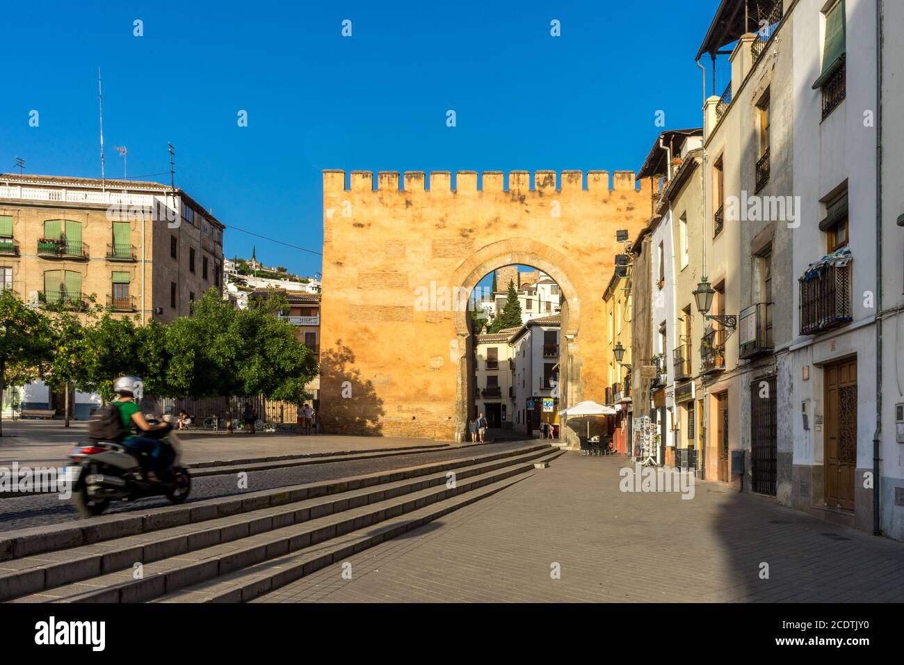 old Entrance wall to the city of Granada, Spain, Europe during golden hour of sunset Stock Photo