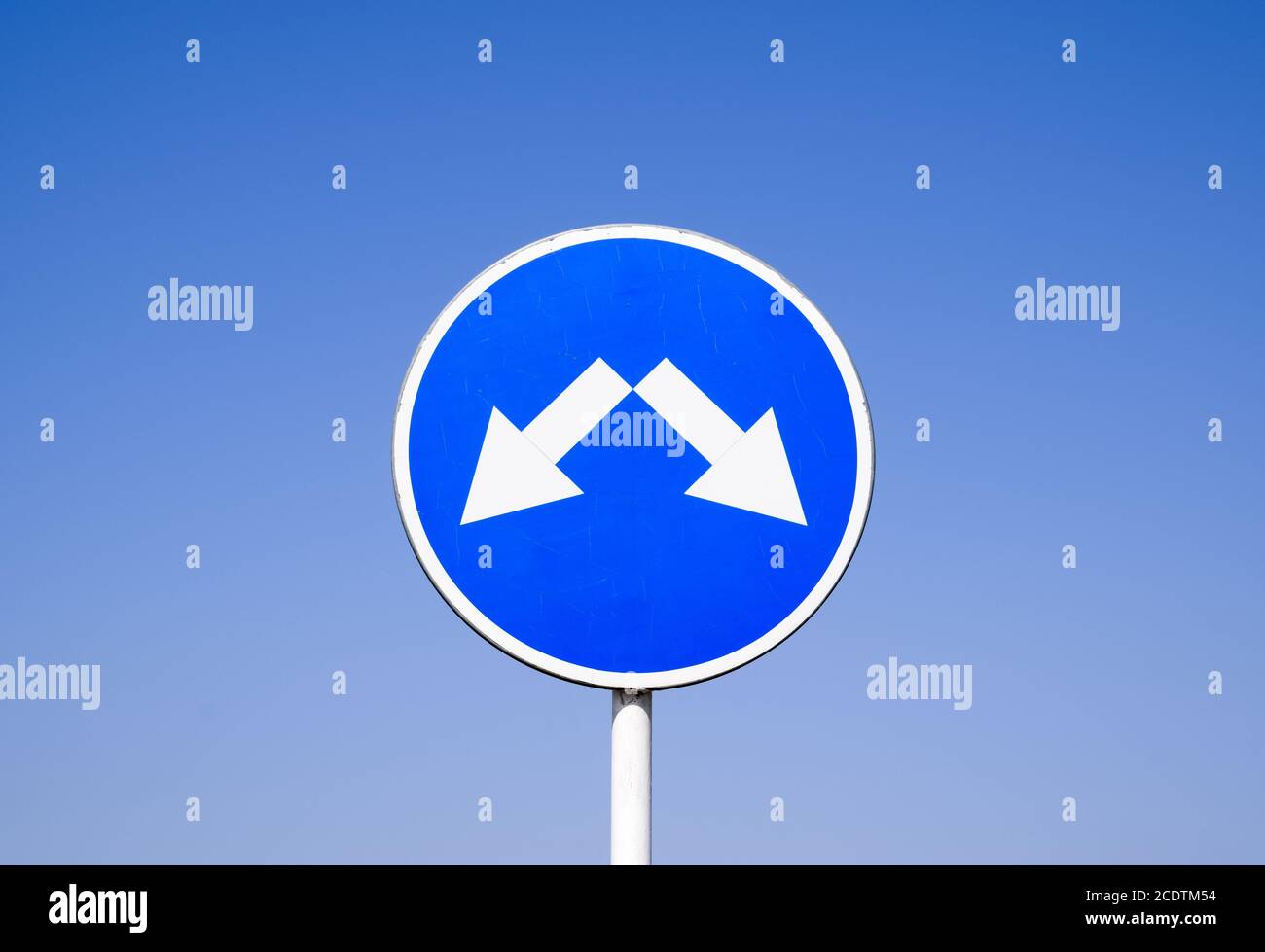 The sign of the crossing. Road signs. Sign on a blue background Stock Photo