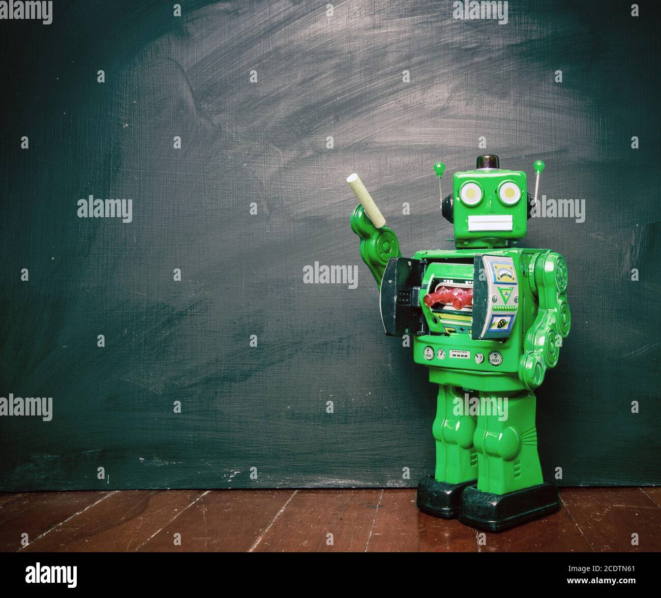 vintage green robot and a blackboard Stock Photo