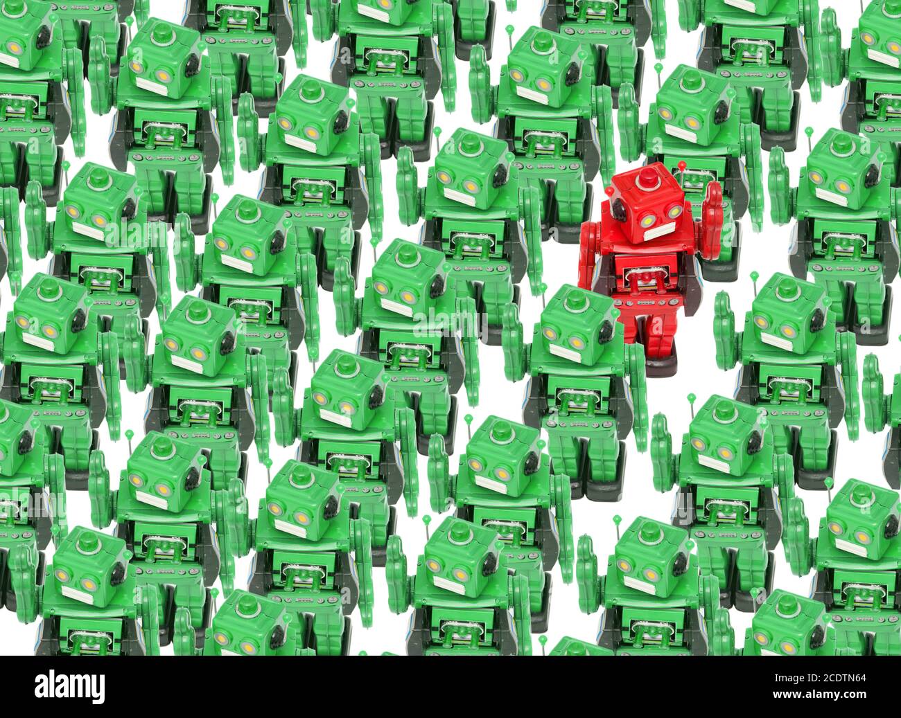 concept gong against the crowed with retro robot toys Stock Photo Alamy