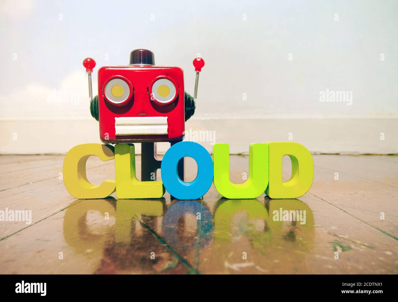 red retro robot head on the word CLOUD Stock Photo