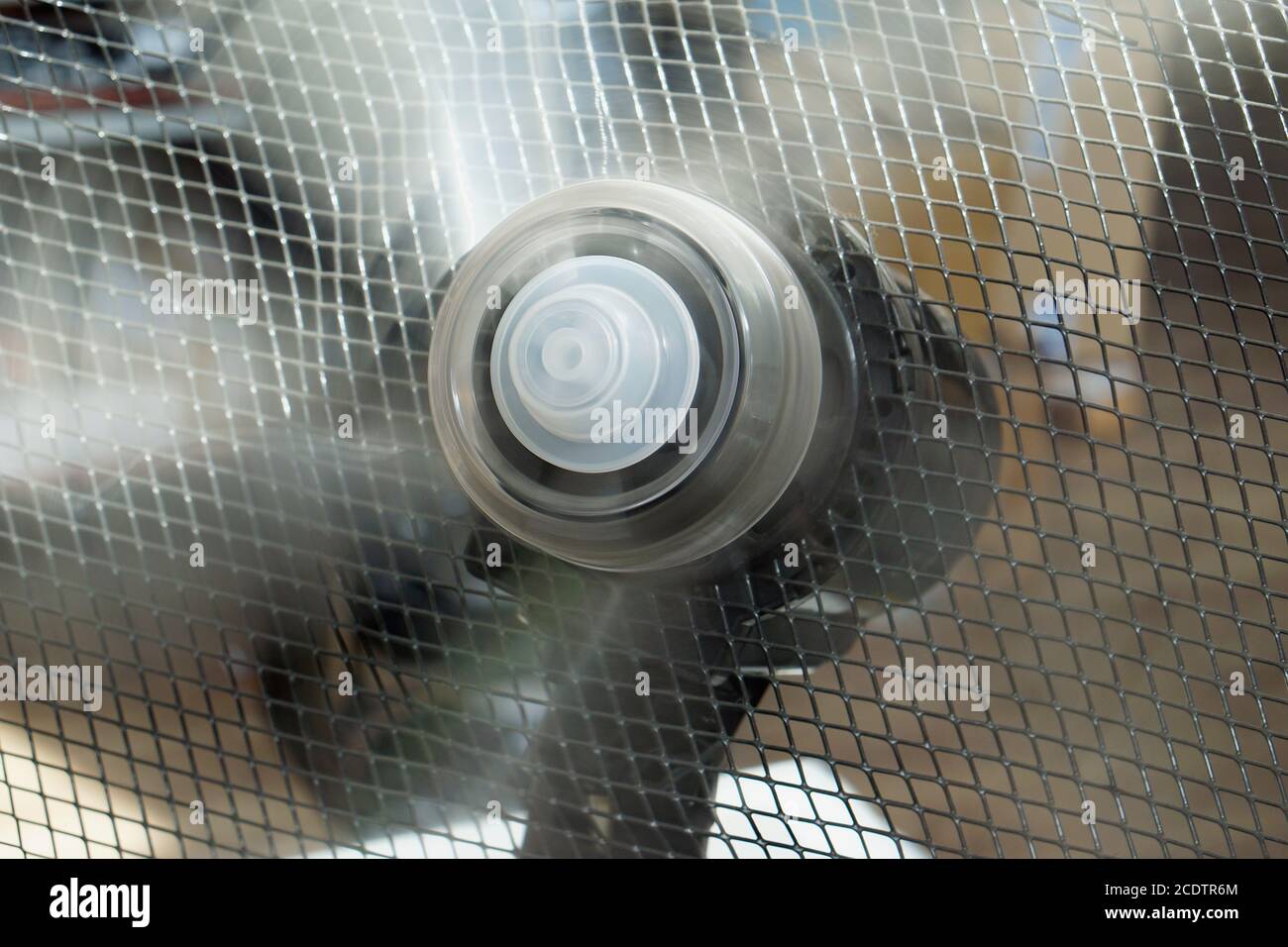 The blades of the home fan rotate at a mad speed Stock Photo