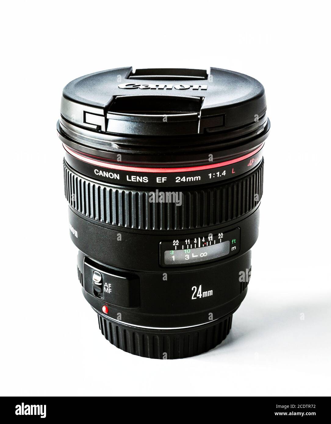 Sideview of Canon EF 24mm f/1/4 USM camera lens with cover Stock Photo