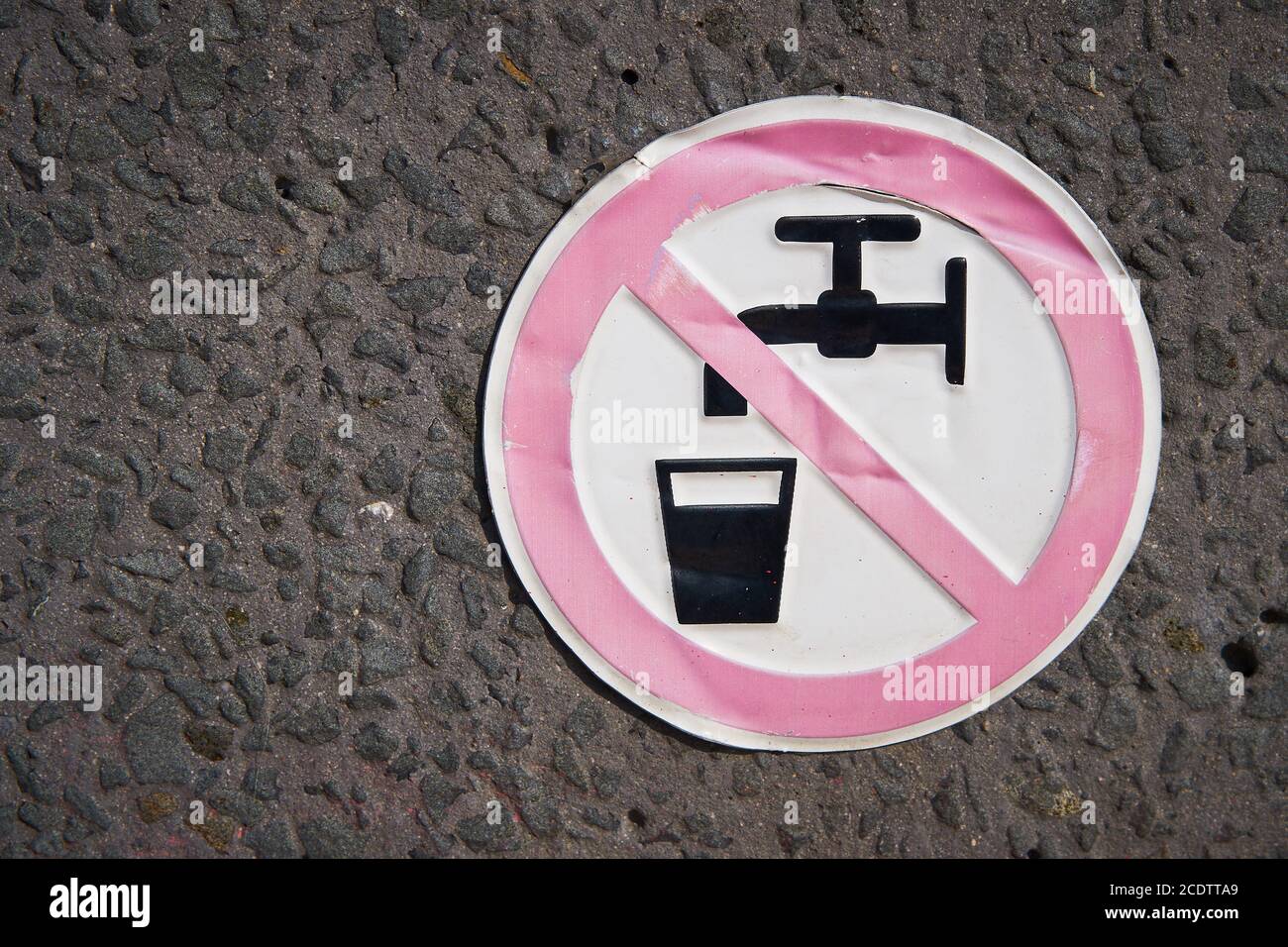 Sign no drinking water at a fountain in the city of Magdeburg Stock Photo
