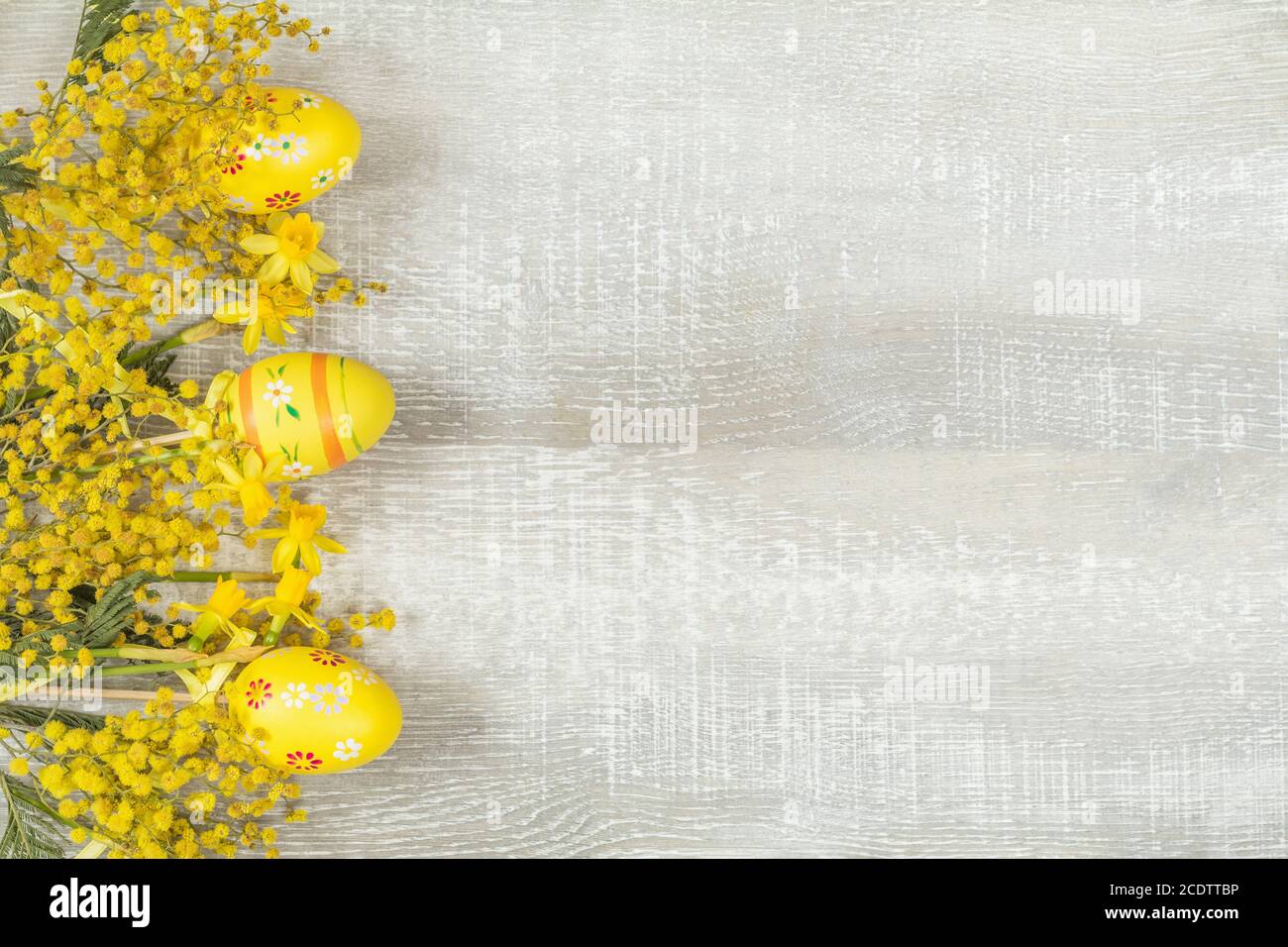 Easter holiday composition in yellow colors with spring flowers Stock ...