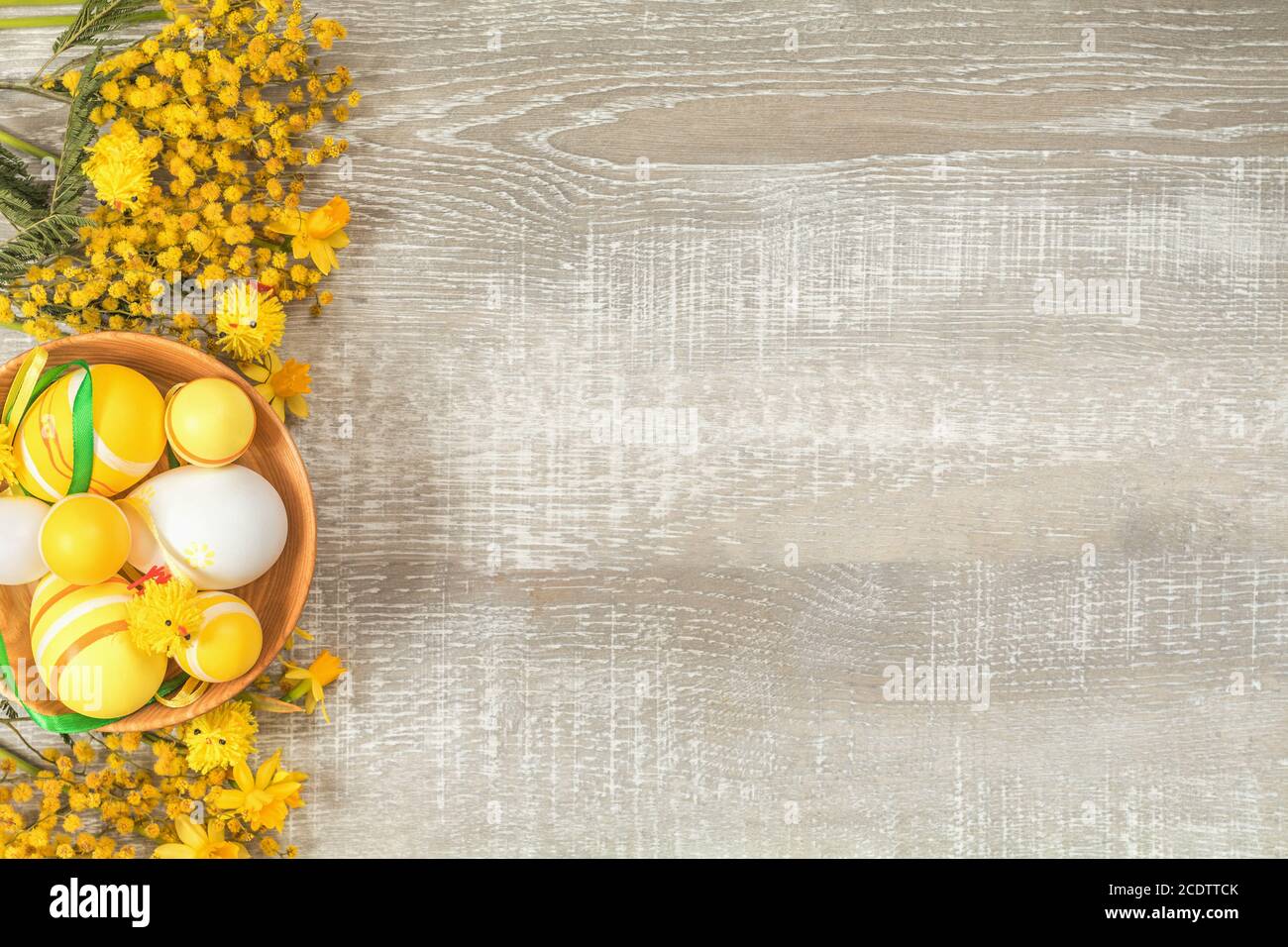Easter holiday composition in yellow colors with spring flowers Stock ...