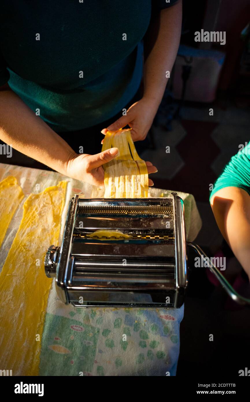 Vintage italian pasta making machine hires stock photography and