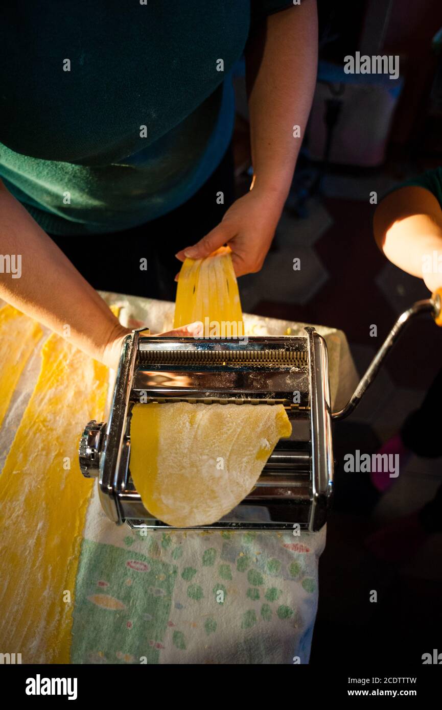 preparation of fresh pasta homemade tagliatelle with the machine by