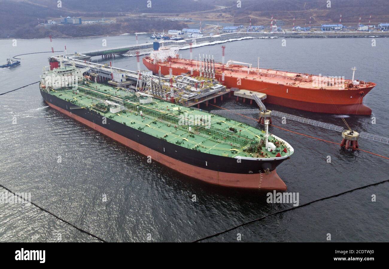Aerial view of Oil tanker ship loading in port, Stock Photo