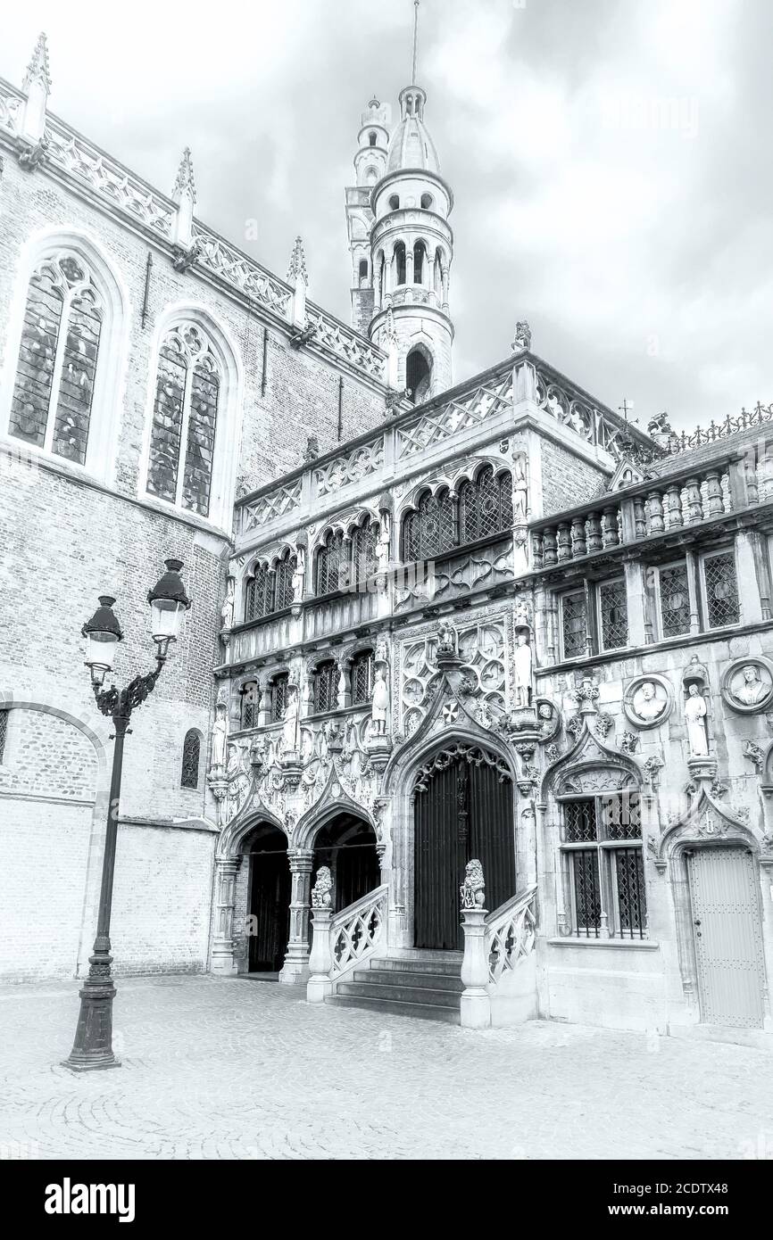 Black and white shot of the Holy Blood Basilica at Burg square in Bruges Stock Photo