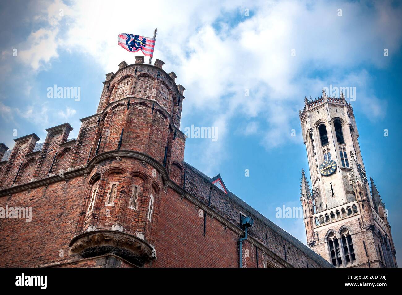 View of the upper part of the famous Brussels Belfry and the walls of the city halls Stock Photo
