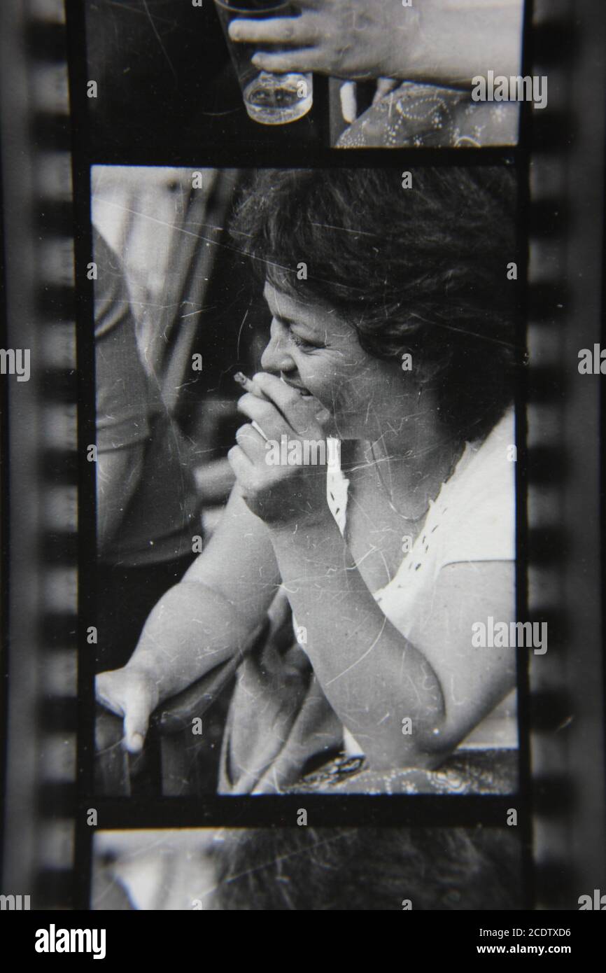 Fine 1970s vintage black and white photography of a woman smoking a ...