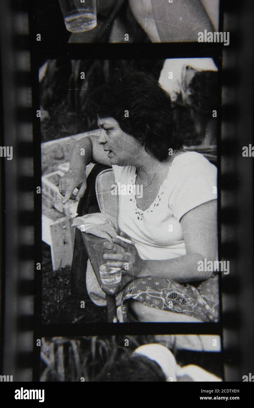 Fine 1970s vintage black and white photography of a woman smoking a ...