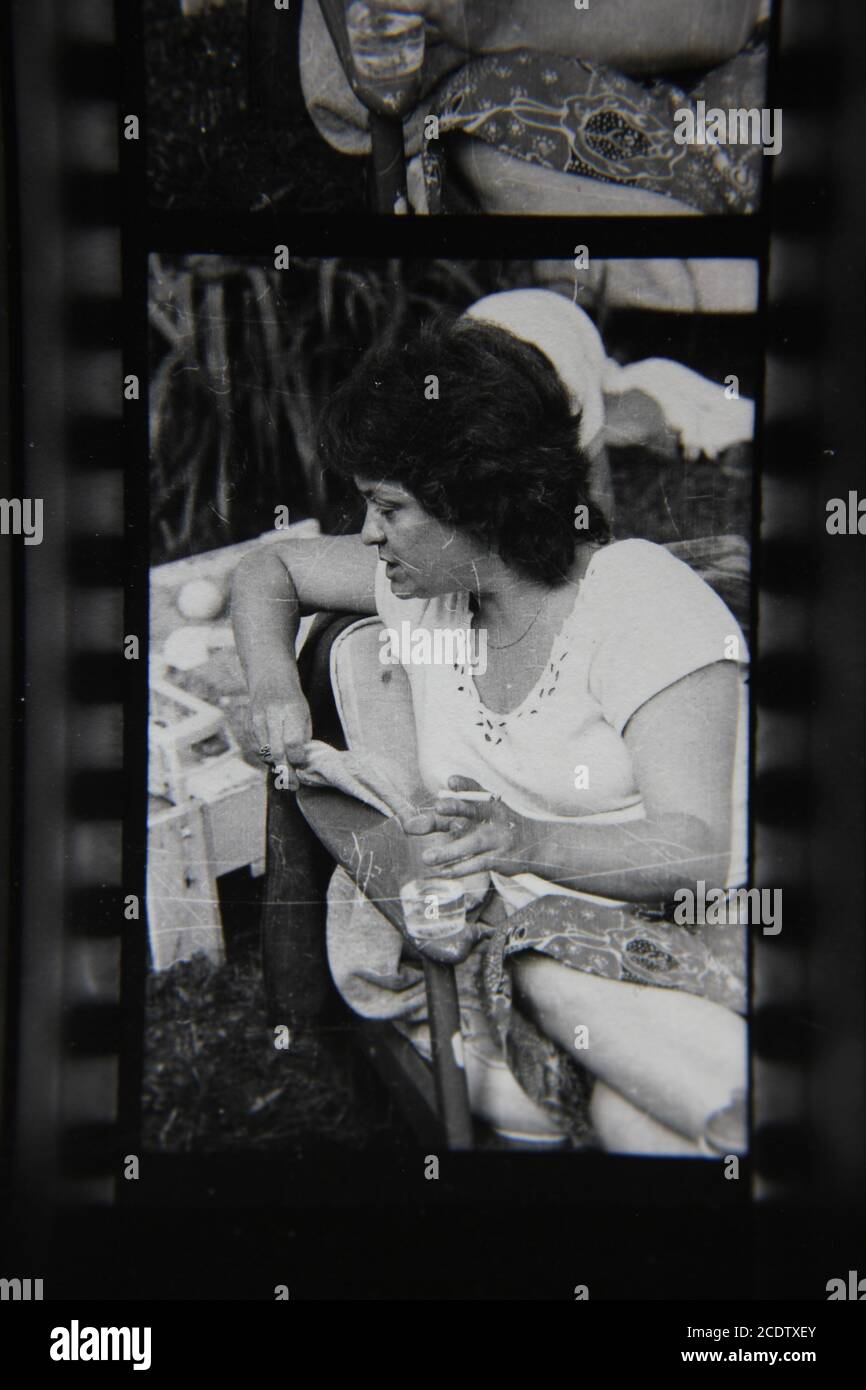 Fine 1970s vintage black and white photography of a woman smoking a ...