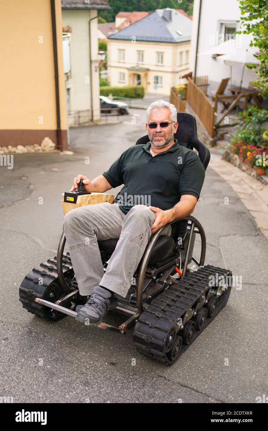 Muggendorf, Germany. 03rd July, 2020. The trained avionics engineer Martin Ebner sits on his self-designed and built off-road wheelchair 'Scuttler'. Credit: Nicolas Armer/dpa/Alamy Live News Stock Photo