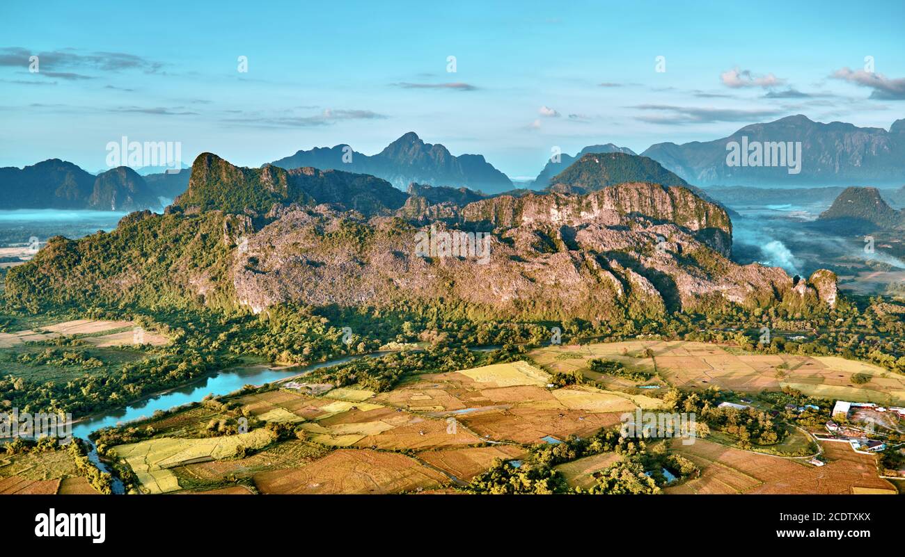 Aerial view of a small town in rocky mountain valley and river Stock ...