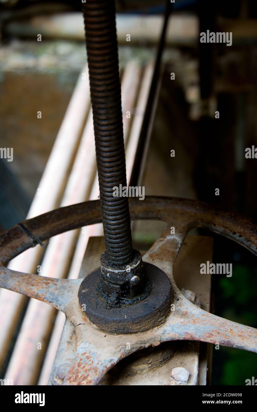 irrigation sluice system with rusty shutoff wheel Stock Photo