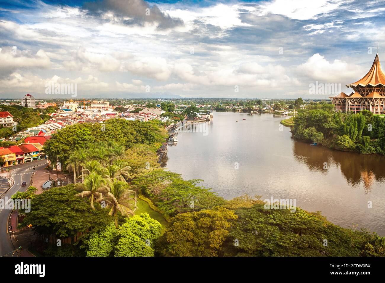 View across the Sarawak River to the southern and northern sides of the city of Kuching with the Wat Stock Photo
