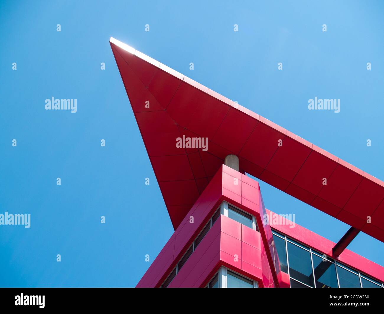 Corner of red modern office building Stock Photo Alamy