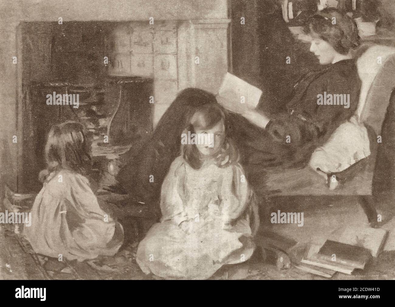 Mom reading kids a Fairy Tale, circa 1920 Stock Photo