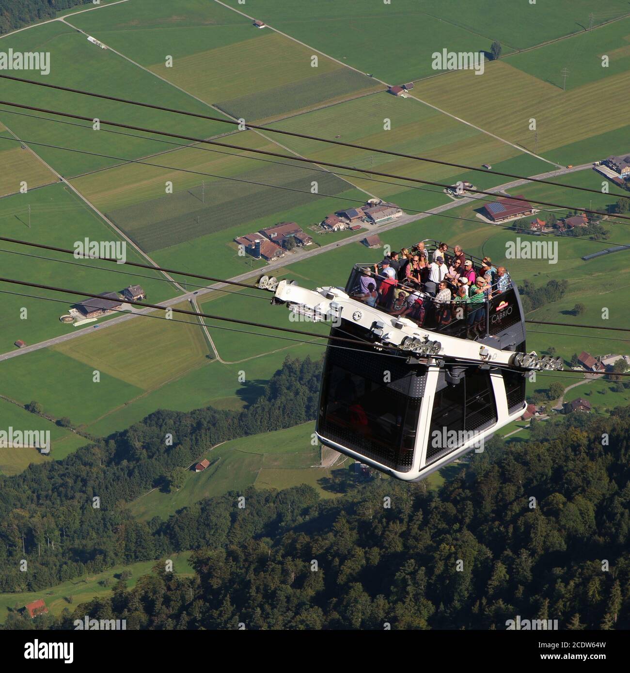 The first cable car of the world with a roofless upper deck. Stanserhorn  cable car, Switzerland Stock Photo - Alamy