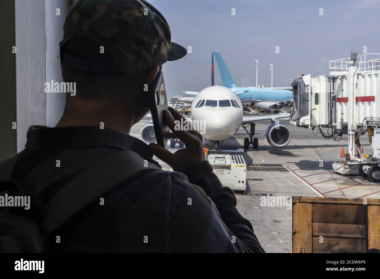 Airport Traveler Calls Law Enforcement After Seeing Terrorist Activity Stock Photo