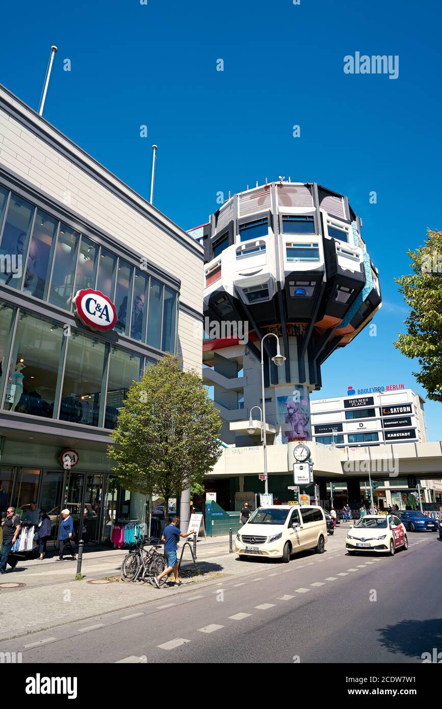 Popular shopping street in the district of Berlin-Steglitz with the Bierpinsel. Stock Photo