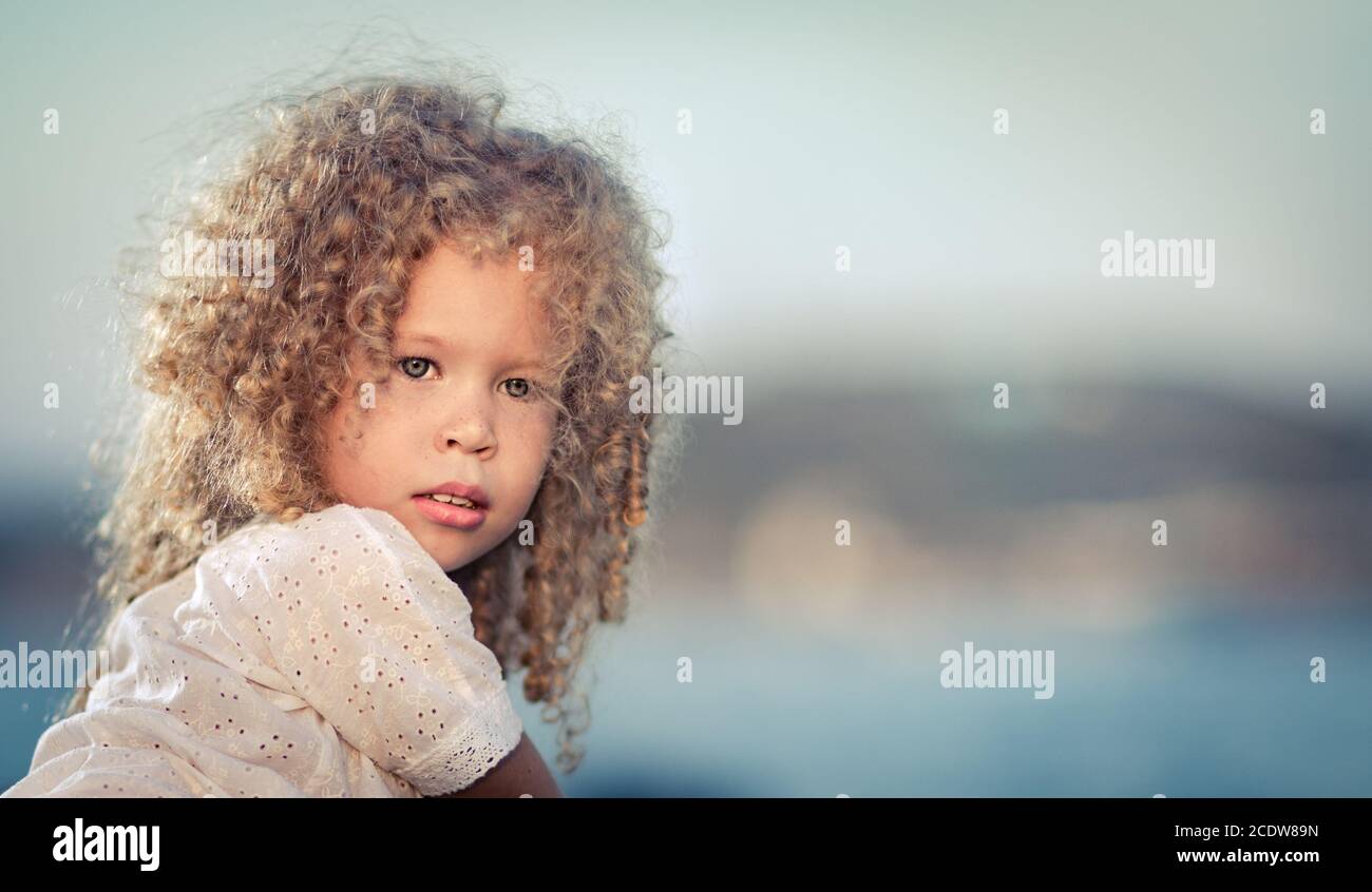 Little girl in white dress Stock Photo - Alamy