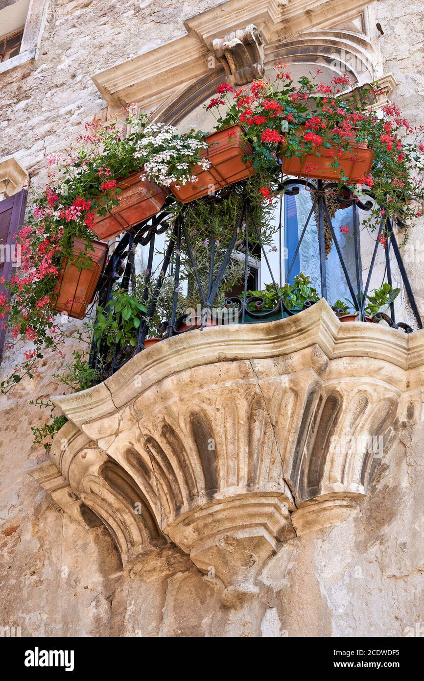 Balcony at a historic building in the old town of Pula in Istria in Croatia Stock Photo