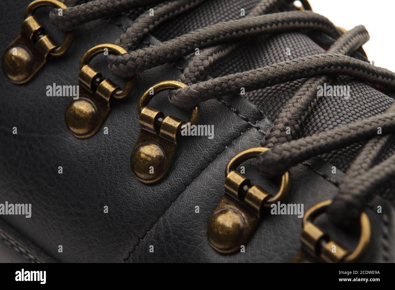 Detail shot of fragmrnt of new fashionable hiking mountain boot. Stock Photo