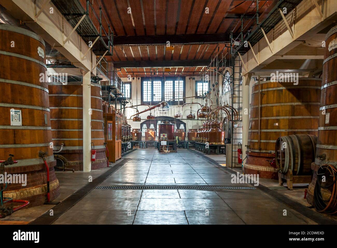 Distilling plants and barrels for the maturation of the spirits of the Palais Bénédictine Stock Photo