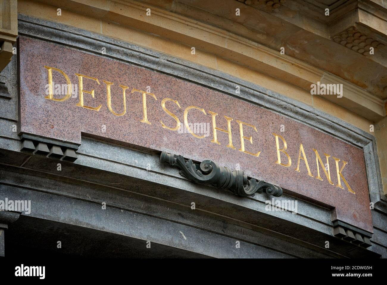 Lettering Deutsche Bank at a historic bank building in the city center of Leipzig Stock Photo