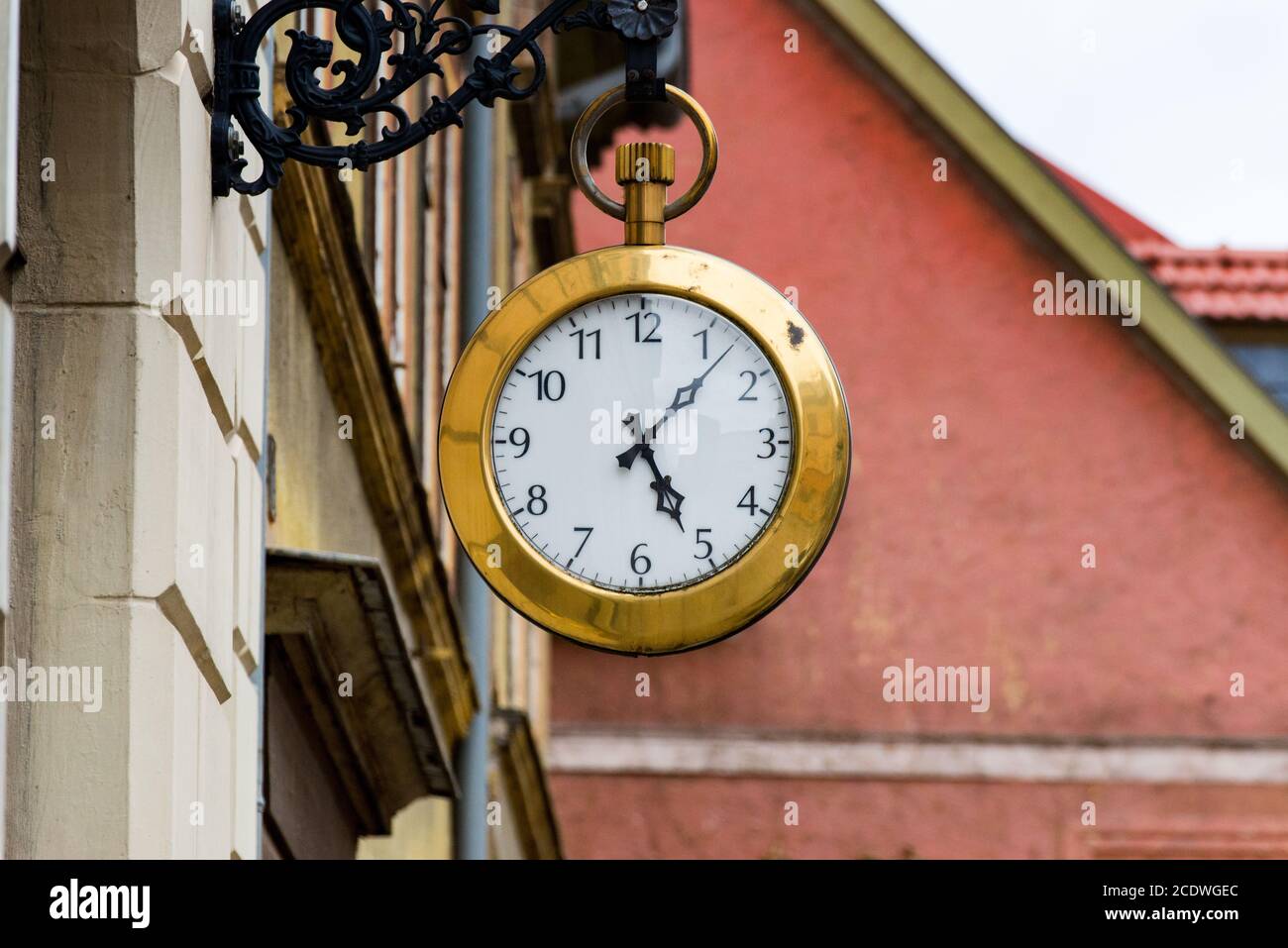 Large pocket watch as the logo of a watch shop Stock Photo