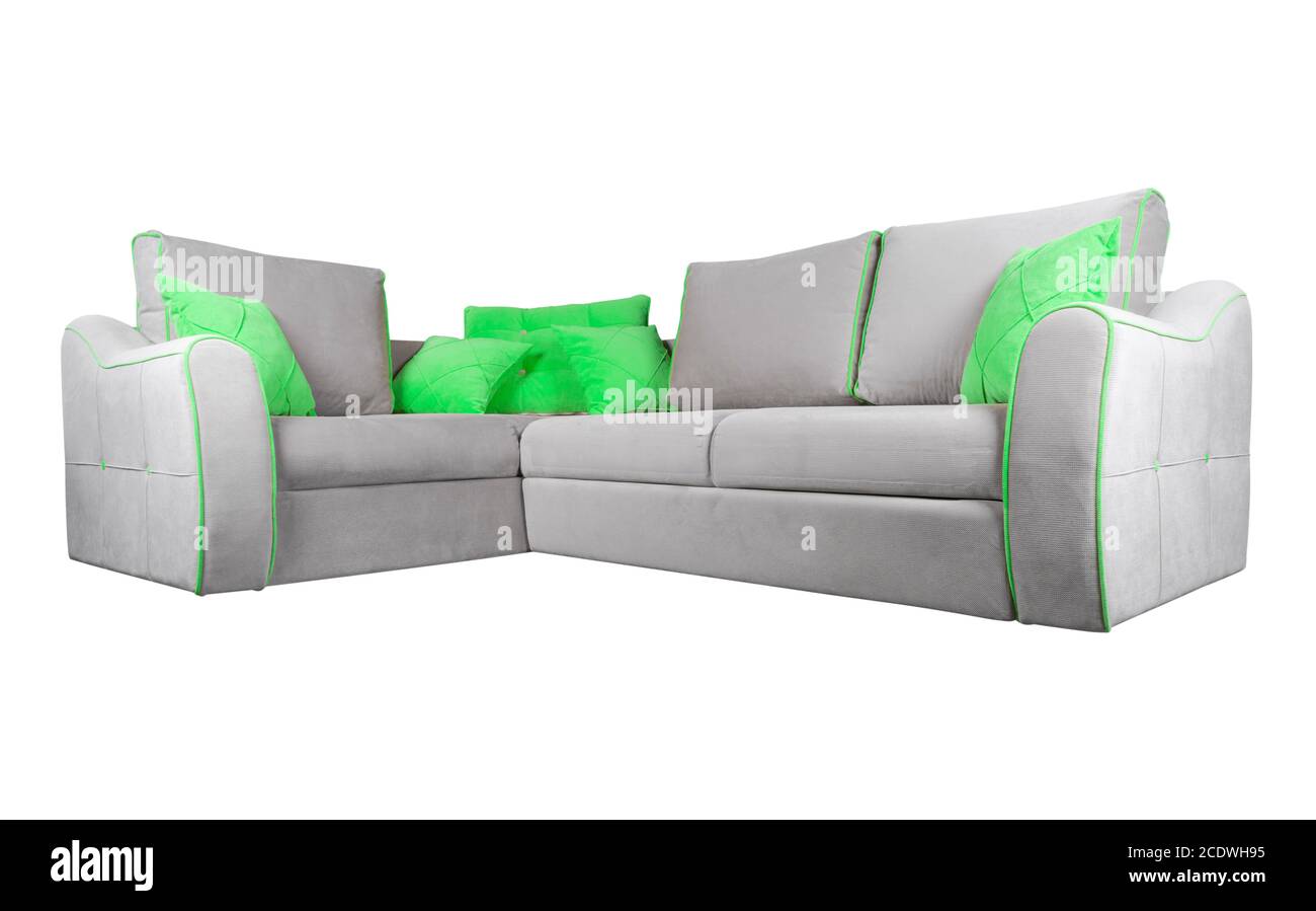 Gray sofa with green pillows isolated on a white background. Gray sofa