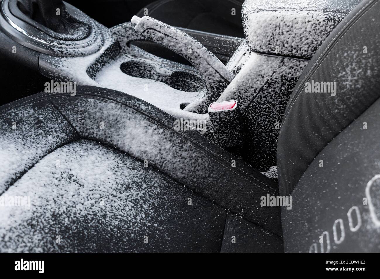 a man cleaning car interior by use foam chemical and scrubbing machine  Stock Photo - Alamy