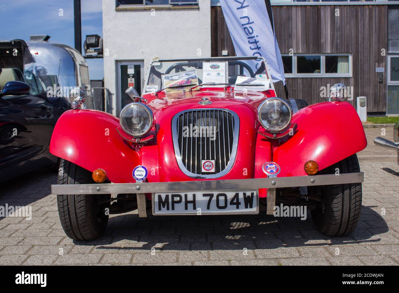 Red Merlin Sports Car on Display at Falkirk Wheel During Kit Car Meet Stock Photo