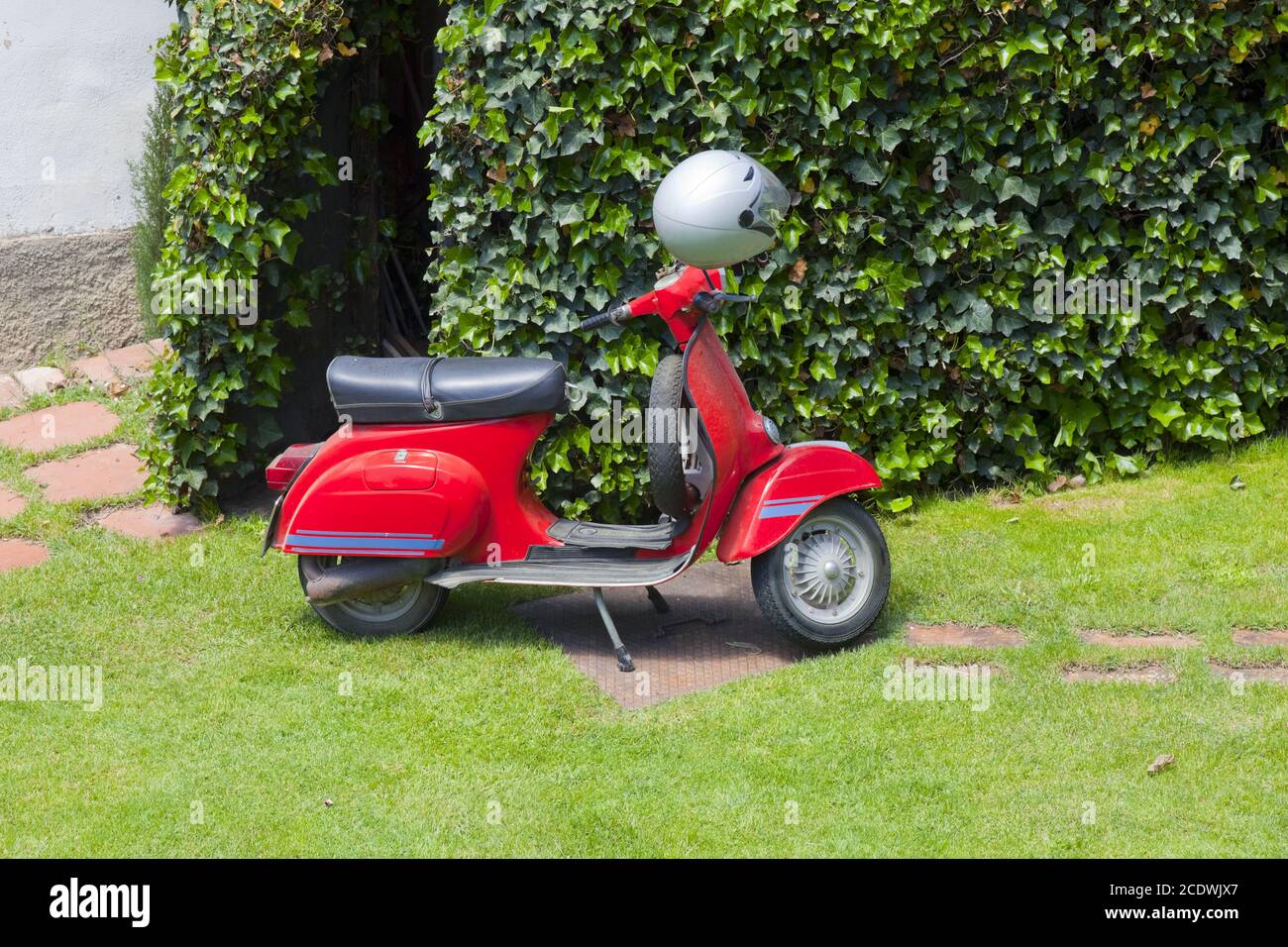 Beautiful red scooter,italian style. Stock Photo
