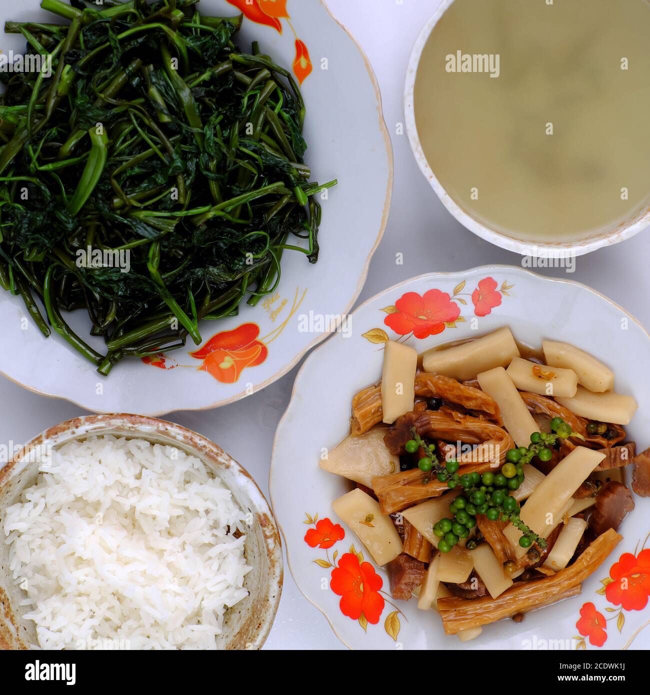 Top view vegan daily meal for lunch, boiled water spinach, tofu skin