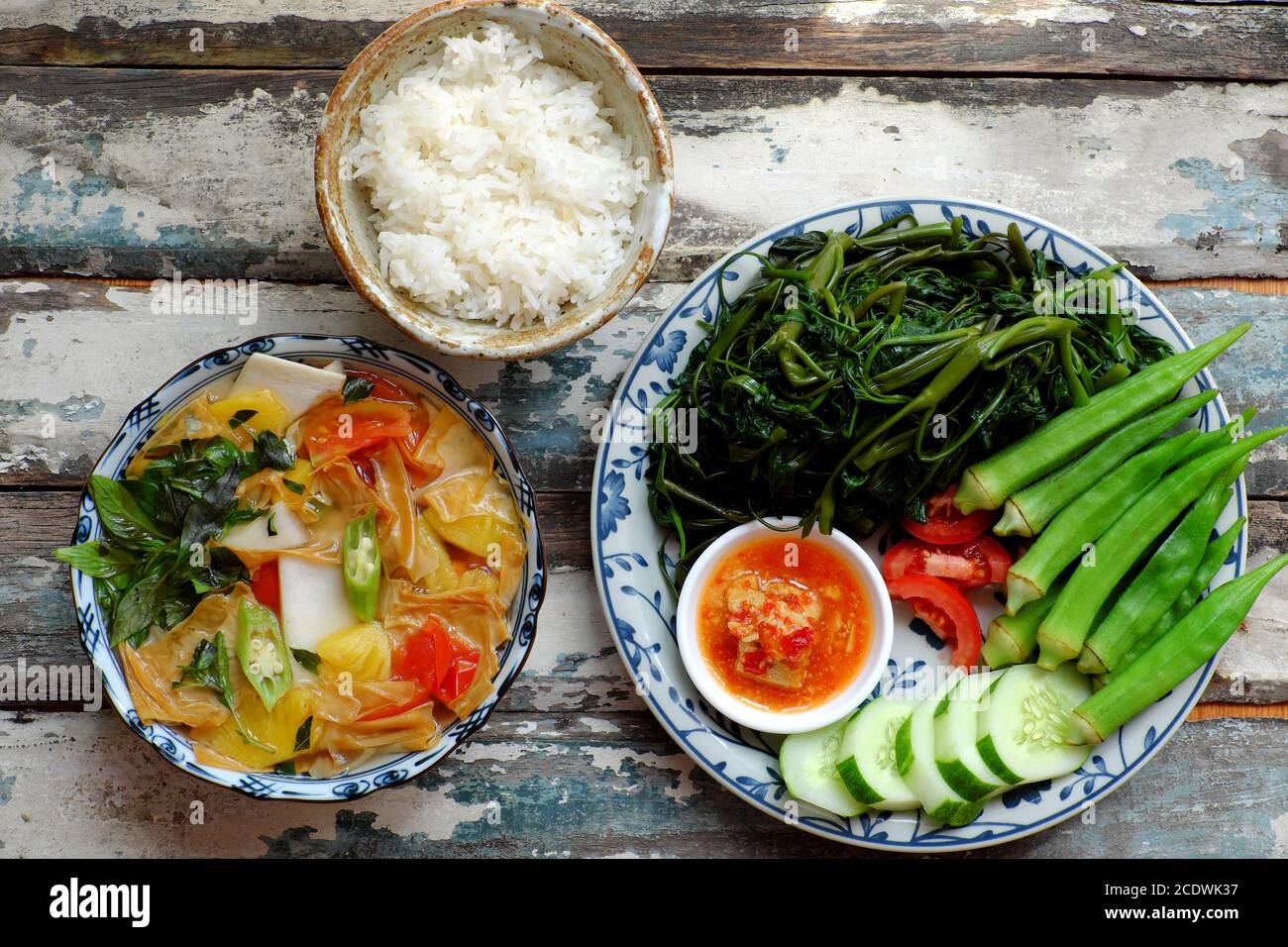 Vegan daily meal, boiled okra, water spinach, cucumber with tofu cheese